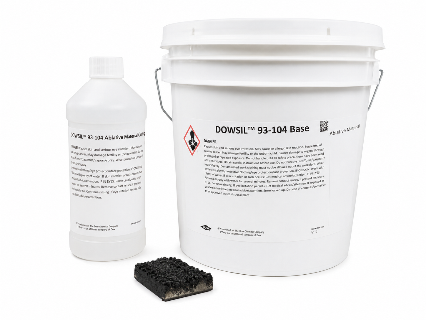 product photo of a Dow DOWSIL 93-104 Ablative Material two-part kit with a charred black test sample, studio lighting on white background, 500x375